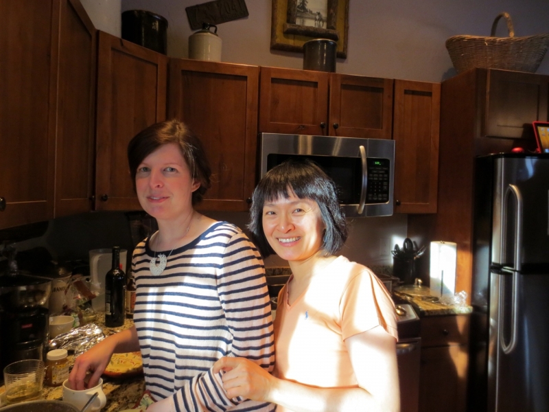 Writer Michelle Aldredge and Composer Eun Young Lee prepare a Korean meal at Brush Creek Foundation for the Arts, a residency in Saratoga, Wyoming (Photo by Anne Connell)